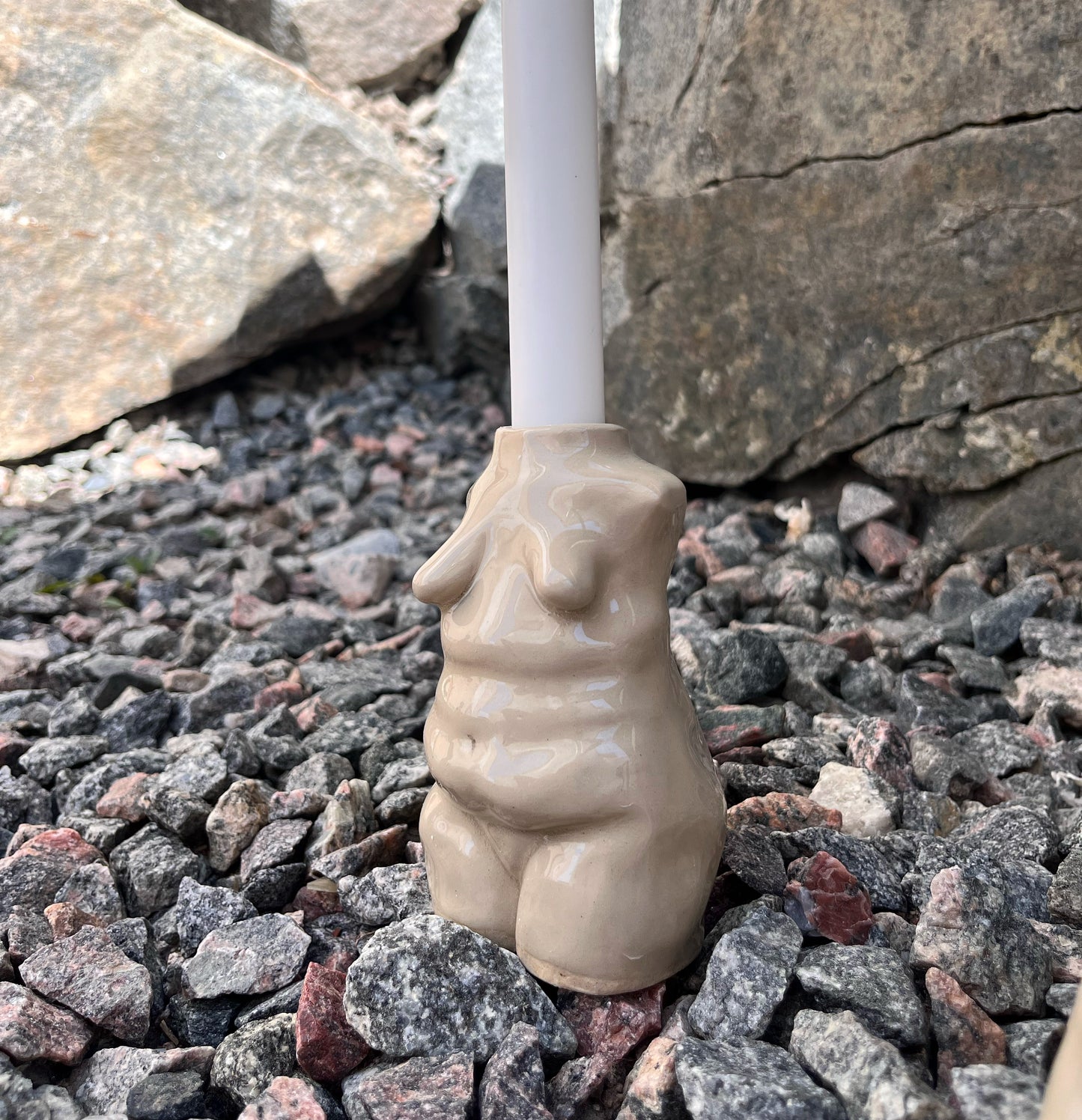 Ljusstake kvinnokropp