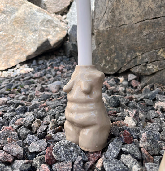 Ljusstake kvinnokropp